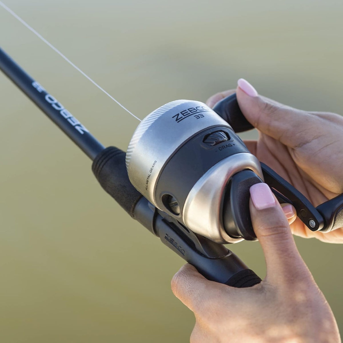 Silver/Black 6-Foot 2-Piece Fiberglass Spincast Reel and Fishing Rod Combo H3943